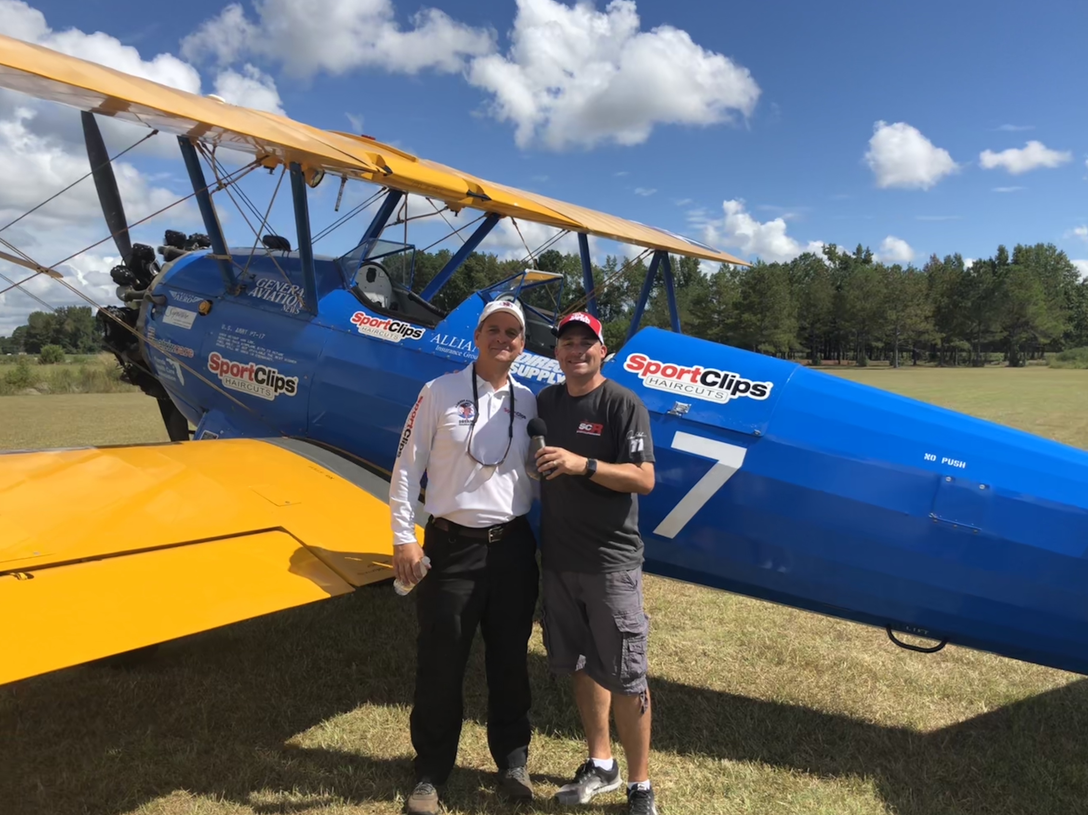 Tim Newton and Chad Jordan in front of plane